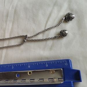 Silver necklace with purple stones